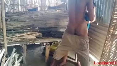 Bihari babu pounds his malkin outdoors in a hut