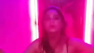 Enticing young woman reveals private parts posing in XXX lingerie