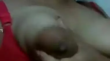 Eye-catching Indian girl has fun playing with sexy huge nipples