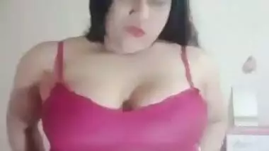 Big boob nude girl shows her butt and squeezes her boobs
