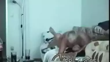 Young indian girl teaching indian how to wear a...